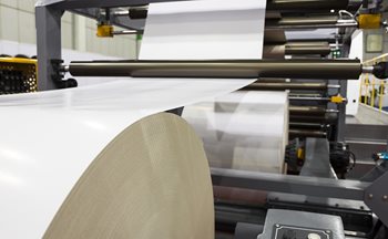 Manufacturing paper rolls in a paper mill